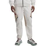 Under Armour Spodnji deli trenirke 1390256-110 Bela Cene