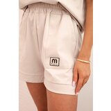 Kesi Włoski Women's punto set with short sleeves and loose shorts beige | shoptok.hr