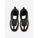 Shelvt Black women's sneakers with white inserts. | Shoptok.si