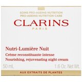 Clarins Nutri-Lumière hranljiva nočna krema 50 ml za ženske | Shoptok.si