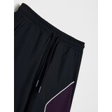 Sinsay Sportske hlače relaxed fit s kontrastnim paspulom Active | shoptok.hr