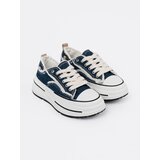 Shelvt Navy blue women's sneakers with white inserts | Shoptok.si
