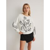 Reserved športni pulover z našitkom - ebenovina | Shoptok.si