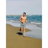 Prugaste kratke hlače za plažu - zelena