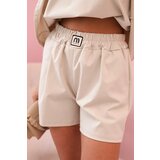 Kesi Włoski Women's set with a frill – a short-sleeved blouse and shorts with an elastic band beige | Shoptok.si