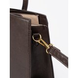 Shelvt Dark brown handbag with a decorative buckle in gold | ePonuda.com