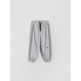 Reserved Pamučne jogger hlače - svijetlo siva | shoptok.hr