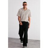 Trendyol Ecru Men's Regular/Normal Cut Low Shoulder Limited Edition Knitwear Look Striped Polo Collar T-shirt cene