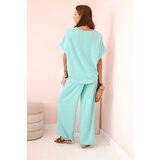 Kesi Włoski Women's viscose set with decorative flower and wide trousers - mint | Shoptok.si