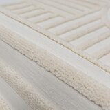 Flair Rugs Kremno bela preproga 133x190 cm Elara – | Shoptok.si
