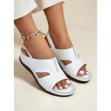 Resti Royal Fashion Women's comfortable and chic sandals with a low wedge heel | Shoptok.si