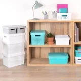 Bela košara za shranjevanje Holes