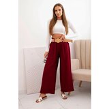 Kesi Włoski Women's viscose trousers with decorative belt burgundy Cijene