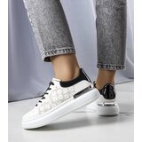 Gemre White and black sneakers decorated with perforation Erin | Shoptok.si