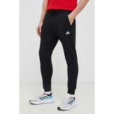 Adidas Pamučni donji dio trenirke boja: crna, glatki materijal | shoptok.hr