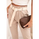 Kesi Włoski Women's viscose pants with a belt and rolled-up hem beige | Shoptok.si