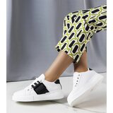 Gemre White sneakers adorned with a black buckle Erin | Shoptok.si