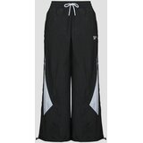 Reebok Spodnji deli trenirke HERITAGE BLOCKED WOVEN TRACK PANT Črna Cene