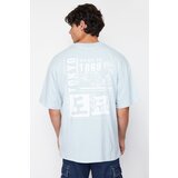 Trendyol Light Blue Oversize/Wide Cut Headlight East Printed 100% Cotton T-Shirt Cene