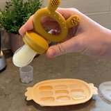 Haakaa silikonski model za pripremu međuobroka ananas Orange peach | shoptok.hr