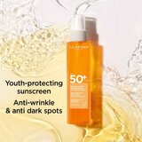 Clarins Sun Body Mist SPF50+ meglica za sončenje v pršilu za telo SPF 50+ 150 ml | Shoptok.si