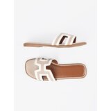 SEASTAR White women's flip-flops on a flat sole | Shoptok.si