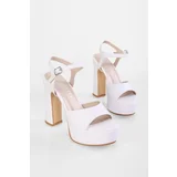 Shoeberry Women's Alyysa White Skin Platform Heel Shoes