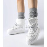 Gemre White insulated snow boots with an elastic band Oslavia | Shoptok.si