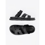 SEASTAR Black women's flip-flops on a flat sole | Shoptok.si