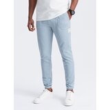 Ombre Men's structured knit sweatpants - light blue Cijene