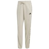 Adidas Spodnji deli trenirke W ANML 3S PNT Bež Cene