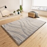 Universal Svetlo sivo-kremno bela preproga 133x190 cm Helia – | Shoptok.si