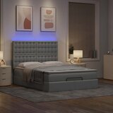 vidaXL Otomanski posteljni okvir z vzmetnico siv 140x190 cm blago | Shoptok.si