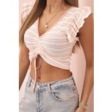 Kesi Women's ribbed blouse with gathering and ruffle powder pink | Shoptok.si