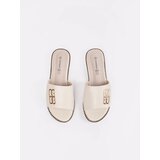 GOODIN Light beige women's flip-flops on a flat sole | Shoptok.si