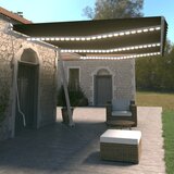 vidaXL Ročno zložljiva tenda z LED lučmi 600x350 cm antracitna Cene
