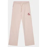 Calvin Klein Jeans Spodnji del trenirke Monogram IG0IG02448 Roza Relaxed Fit