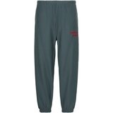 Calvin Klein Jeans Spodnji deli trenirke Premium Terry Graphi Siva Cene