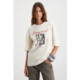 Grimelange Majer Women's 100% Organic Cotton Western Theme Printed Regular Fit Cream T-shirt