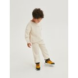 Reserved - Pamučne jogger hlače - boja kože | shoptok.hr