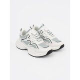 Shelvt White and green sneakers with decorative inserts | Shoptok.si
