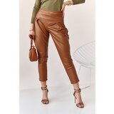 Fasardi Fashionable brown faux leather pants for women cene