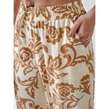 DStreet Spodnie damskie wide leg w kwiaty LOVEGARDEN kamelowe | Shoptok.si