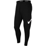 Nike Spodnji deli trenirke Taper Črna Cene