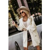 numoco basic 628-1 Fashionable oversized cardigan with a decorative brooch and practical pockets - beige | Shoptok.si