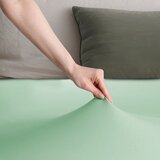 DecoKing Svetlo zelena napenjalna rjuha iz jerseyja 140x200 cm Amber – | Shoptok.si