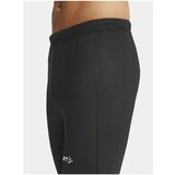 Craft Spodnji deli trenirke Extend Slim Črna | Shoptok.si