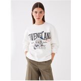 LC Waikiki Women's Crew Neck Printed Long Sleeve Oversized Sweatshirt. Cene