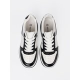 Shelvt Black and white sneakers with shimmering silver details | ePonuda.com