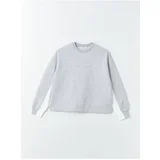 LC Waikiki Women's Crew Neck Straight Long Sleeve Oversized Sweatshirt.